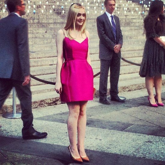 Ever the charming style setter, Dakota Fanning chose a hot pink Lanvin number to go with her nude pointy-toe pumps and gold halo.
Ever the charming style setter, Dakota Fanning chose a hot pink Lanvin number to go with her nude pointy-toe pumps and gold halo.