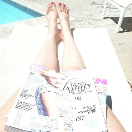 CelebStyle enjoys some poolside reading.
CelebStyle enjoys some poolside reading.