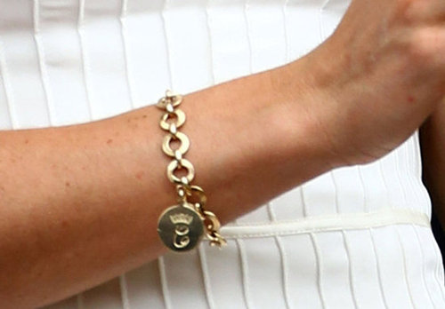 A close-up on Kate's gold tennis bracelet (spotted on her at Wimbledon) — it's engraved with a crowned "C."
A close-up on Kate's gold tennis bracelet (spotted on her at Wimbledon) — it's engraved with a crowned "C."
