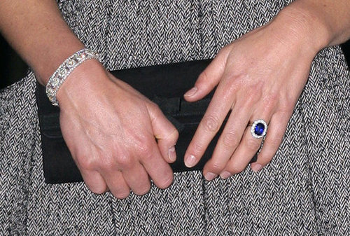 Here's a close-up of the bracelet and her slick black clutch.
Here's a close-up of the bracelet and her slick black clutch.