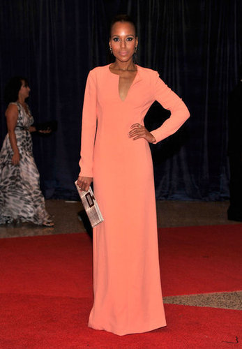 Kerry Washington posed on the red carpet in a long coral gown.
Kerry Washington posed on the red carpet in a long coral gown.
