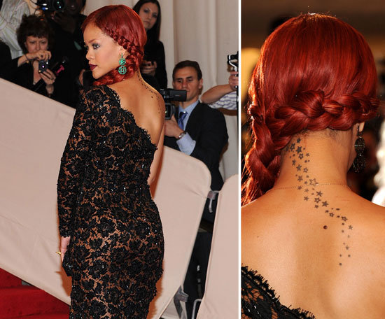 The group of stars on the back of Rihanna's neck were completed in different sittings.
The group of stars on the back of Rihanna's neck were completed in different sittings.