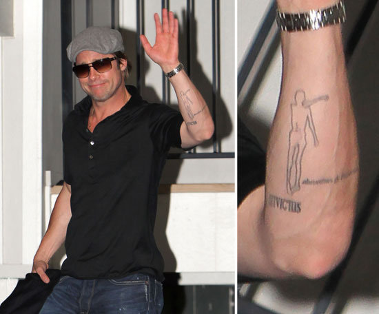 Brad Pitt hasn't commented on the meaning behind the iceman tattoo on his left forearm.
Brad Pitt hasn't commented on the meaning behind the iceman tattoo on his left forearm.