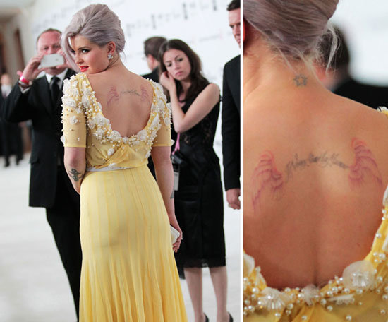 Kelly Osbourne has multiple pieces on her back including a star on her neck and the words "I love my mommy" in French.
Kelly Osbourne has multiple pieces on her back including a star on her neck and the words "I love my mommy" in French.