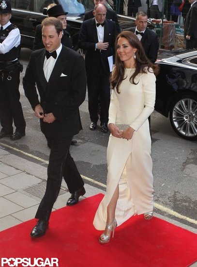 /></p> <p>Kate Middleton and her husband Prince William arrived at Claridge's in London this evening. She was decked out in a long white gown from Roland Mouret, surely rivaling any of the high fashions seen in NYC last night at the Met Gala.  Kate paired the white dress with a chic pair of sky-high Jimmy Choos. The sandals revealed that Kate has her toes painted a dark berry color!</p>