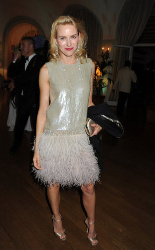 Naomi Watts stepped out in a feather-skirted silver frock.
Naomi Watts stepped out in a feather-skirted silver frock.