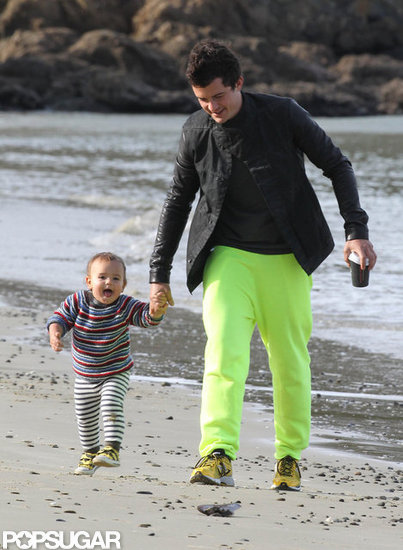 Orlando Bloom walked on a New Zealand beach with Flynn. Orlando Bloom walked on a New Zealand beach with Flynn.