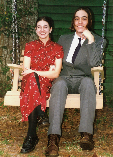 "My date and I both wore Doc Martens (hey, it was the '90s!). We didn't get our photo taken at the prom, just beforehand in my friend's backyard. I bought the dress the day before at the mall, and I called my date the day of the prom to ask him out. Luckily, he had a vintage suit to wear; we ended up dating for the rest of high school. My mom fixed my hair, with fresh red flowers in a bun." — Nancy Einhart, executive editor
"My date and I both wore Doc Martens (hey, it was the '90s!). We didn't get our photo taken at the prom, just beforehand in my friend's backyard. I bought the dress the day before at the mall, and I called my date the day of the prom to ask him out. Luckily, he had a vintage suit to wear; we ended up dating for the rest of high school. My mom fixed my hair, with fresh red flowers in a bun." — Nancy Einhart, executive editor