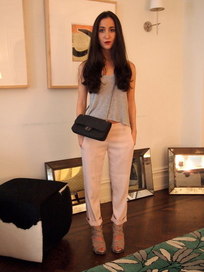 Silk Pale pink pants, toughed up with a chain strap bag and burgundy lipstick. 