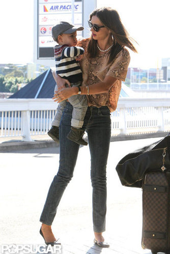 Miranda Kerr carried son, Flynn Bloom, as they left Sydney.
Miranda Kerr carried son, Flynn Bloom, as they left Sydney.