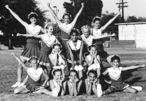 Prior to Bring It On, Kirsten Dunst, posing in the second row on the left, was a high school cheerleader.
Prior to Bring It On, Kirsten Dunst, posing in the second row on the left, was a high school cheerleader.