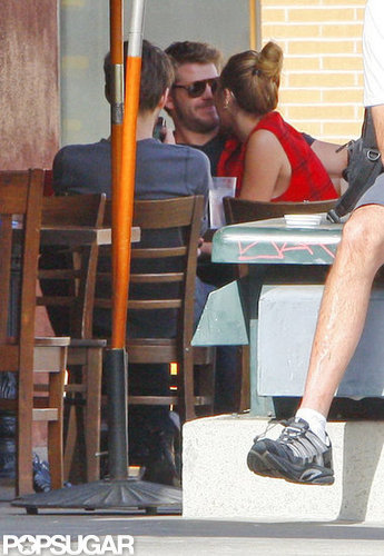 Miley Cyrus snuggled up to Liam Hemsworth while dining in LA in January 2012.
Miley Cyrus snuggled up to Liam Hemsworth while dining in LA in January 2012.