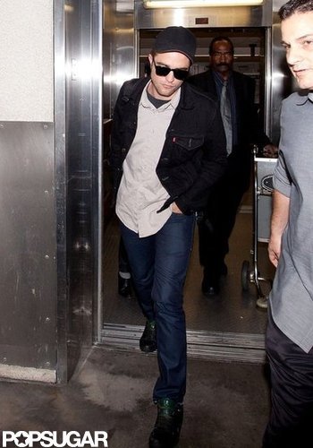 Robert Pattinson returned to the West Coast after a minitour for Cosmopolis.
Robert Pattinson returned to the West Coast after a minitour for Cosmopolis.