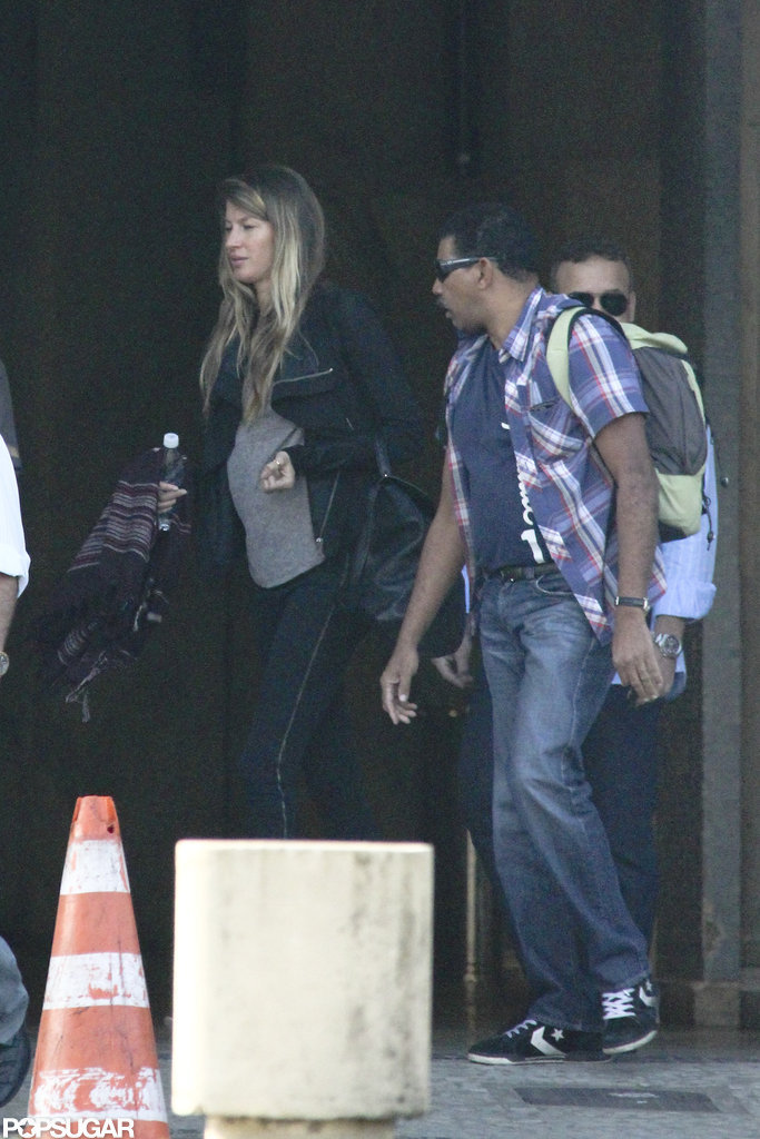 Gisele Bundchen's baby bump showed while she was out in Brazil. Gisele Bundchen's baby bump showed while she was out in Brazil.
