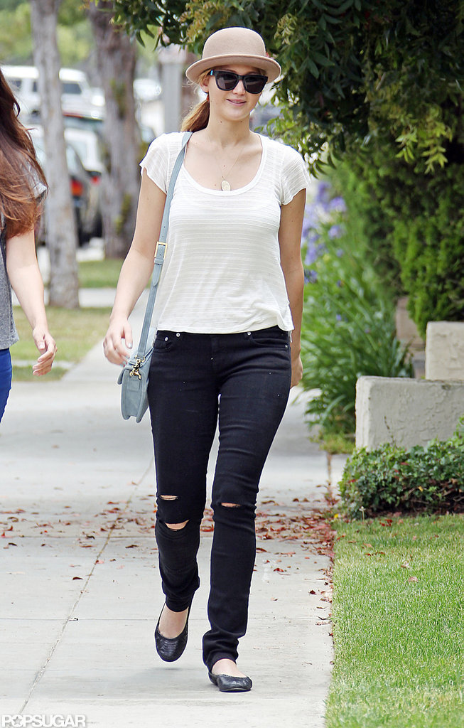 Jennifer Lawrence wore a white shirt and bowler hat.
Jennifer Lawrence wore a white shirt and bowler hat.