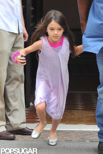 Suri Cruise wore a dress and flats in NYC.
Suri Cruise wore a dress and flats in NYC.