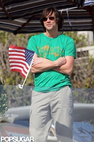 Jim Carrey waved an American flag during a 2010 party in Malibu, CA, for Fourth of July.
Jim Carrey waved an American flag during a 2010 party in Malibu, CA, for Fourth of July.