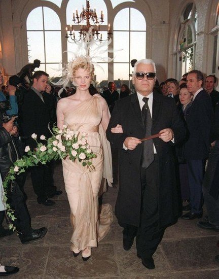 Kristen McMenamy wore custom Karl Lagerfeld (and walked down the aisle with the designer!) when she married photographer Miles Aldridge outside London in October 1997.
Kristen McMenamy wore custom Karl Lagerfeld (and walked down the aisle with the designer!) when she married photographer Miles Aldridge outside London in October 1997.