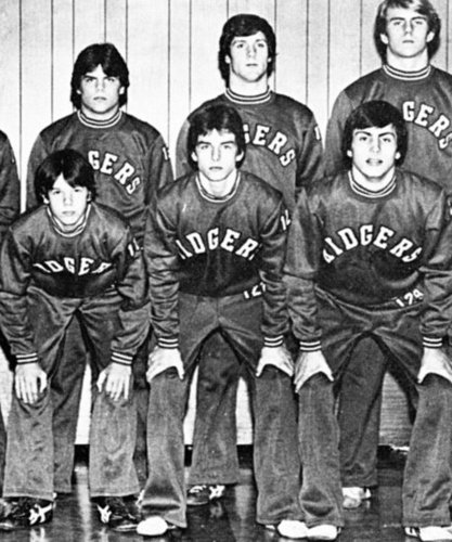 Tom Cruise, center bottom, posed with his high school wrestling team.
Tom Cruise, center bottom, posed with his high school wrestling team.