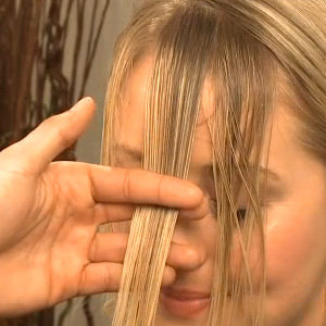 Tempted To Cut Your Own Bangs at Home? Watch This First!