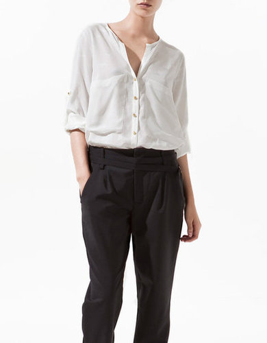 Every trip (no matter the destination) deserves one go-with-everything blouse. This slouchy top is breezy, sleek, and, like we said, will go with everything, from fitted trousers and flats to casual denim cutoffs and sneakers.
Zara Jacquard Blouse With Contrasting Lapel ($80)
Every trip (no matter the destination) deserves one go-with-everything blouse. This slouchy top is breezy, sleek, and, like we said, will go with everything, from fitted trousers and flats to casual denim cutoffs and sneakers.
Zara Jacquard Blouse With Contrasting Lapel ($80)