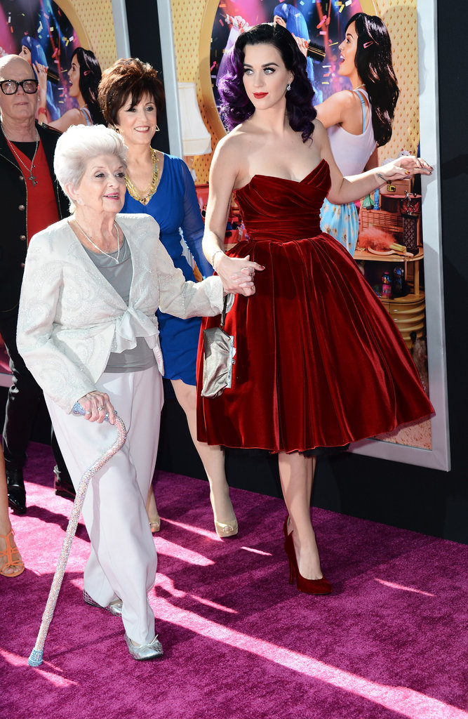 The film features her parents, and even her grandma, who is pictured here walking the purple carpet with her superstar granddaughter at Paramount's premiere of Katy Perry Part of Me earlier this week. The film features her parents, and even her grandma, who is pictured here walking the purple carpet with her superstar granddaughter at Paramount's premiere of Katy Perry Part of Me earlier this week.