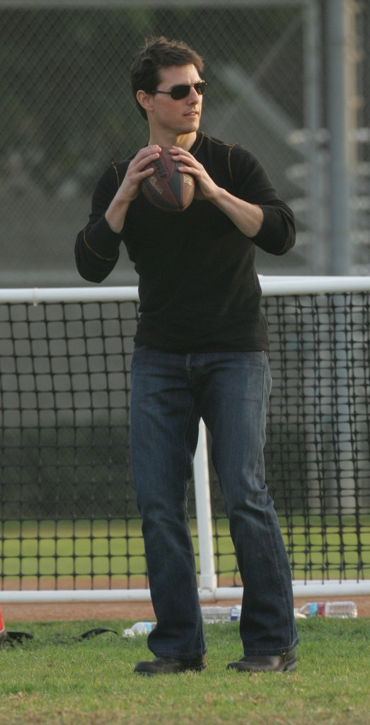 Tom Cruise got athletic to throw a football around while attending his daughter Isabella's soccer game in LA in November 2005.
Tom Cruise got athletic to throw a football around while attending his daughter Isabella's soccer game in LA in November 2005.