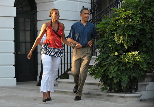 In 2010, Michelle and Barack hustled hand in hand to greet families at that year's barbecue.
In 2010, Michelle and Barack hustled hand in hand to greet families at that year's barbecue.