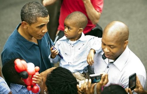 Barack got close with some people in the crowd at the 2010 White House party.
Barack got close with some people in the crowd at the 2010 White House party.
