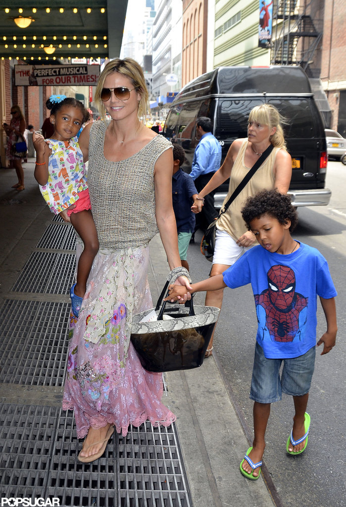 Heidi Klum pulled her hair up while hanging out with her kids in NYC. Heidi Klum pulled her hair up while hanging out with her kids in NYC.