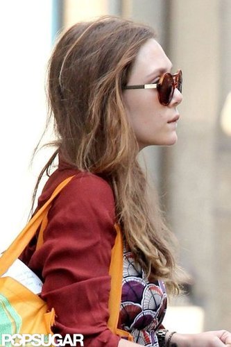 Elizabeth Olsen wore dark sunglasses.
Elizabeth Olsen wore dark sunglasses.