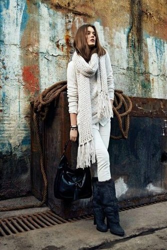Long fringed scarves, luxe boots, and cream layers give Hugo Boss Orange's Fall campaign a distinctly cool cold weather vibe.
Long fringed scarves, luxe boots, and cream layers give Hugo Boss Orange's Fall campaign a distinctly cool cold weather vibe.