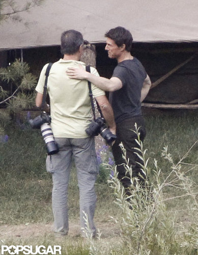 Tom Cruise talked with photographer David James on the set of Oblivion in June Lake, CA.
Tom Cruise talked with photographer David James on the set of Oblivion in June Lake, CA.