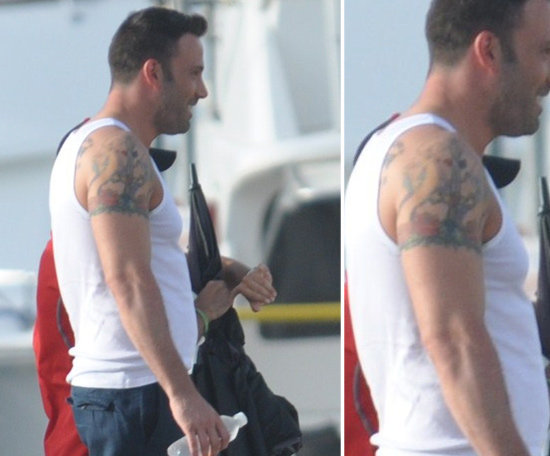 Ben Affleck has a tree and band of roses tattooed around his right bicep.
Ben Affleck has a tree and band of roses tattooed around his right bicep.