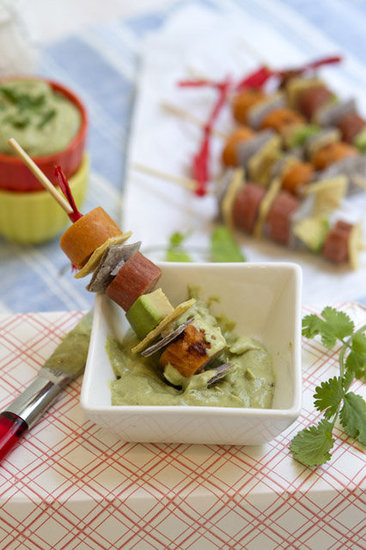 If they like: Traditional hot dogs
Try: Grilled hot dog skewers and creamy avocado dip
Keep the hot dog flavor that kids love while knowing that they're getting a healthy alternative. This inventive recipe from Family Fresh Cooking Swap, for instance, swaps buns for tortilla squares and a fresh dip instead of ketchup.
Source: Family Fresh Cooking
If they like: Traditional hot dogs
Try: Grilled hot dog skewers and creamy avocado dip
Keep the hot dog flavor that kids love while knowing that they're getting a healthy alternative. This inventive recipe from Family Fresh Cooking Swap, for instance, swaps buns for tortilla squares and a fresh dip instead of ketchup.
Source: Family Fresh Cooking