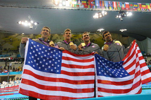 Michael Phelps posed for photos with his fellow gold medal winning relay teammates Ryan Locte, Ricky Berens, and Conor Dwyer.
Michael Phelps posed for photos with his fellow gold medal winning relay teammates Ryan Locte, Ricky Berens, and Conor Dwyer.
