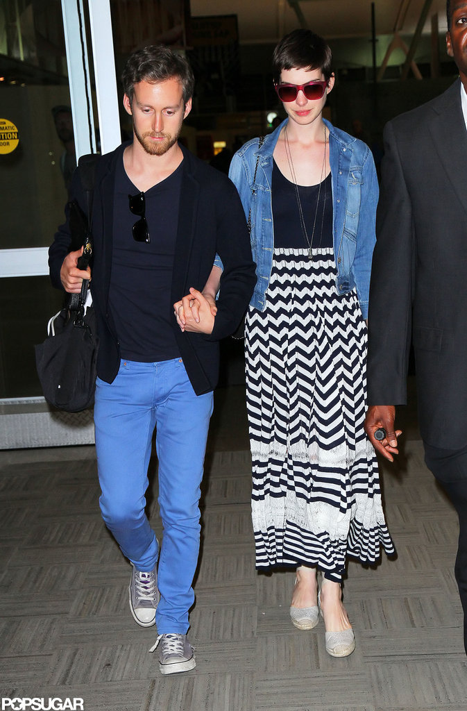 Anne Hathaway arrived in NYC with fiancé Adam Shulman. Anne Hathaway arrived in NYC with fiancé Adam Shulman.