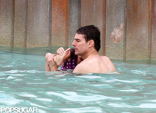Shirtless Tom Cruise Splashes Around at a Water Park With Suri Shirtless Tom Cruise Splashes Around at a Water Park With Suri