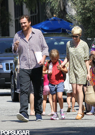 Michelle Williams took Matilda by the hand while taking a stroll with Jason Segel in LA. Michelle Williams took Matilda by the hand while taking a stroll with Jason Segel in LA.