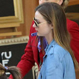 Miranda Kerr's Travel Style: Denim Shirt and White Flared Jeans Miranda Kerr's Travel Style: Denim Shirt and White Flared Jeans