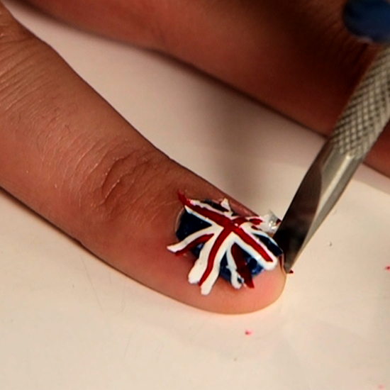 Make Your Own Nail Decals With Wax Paper and Nail Polish