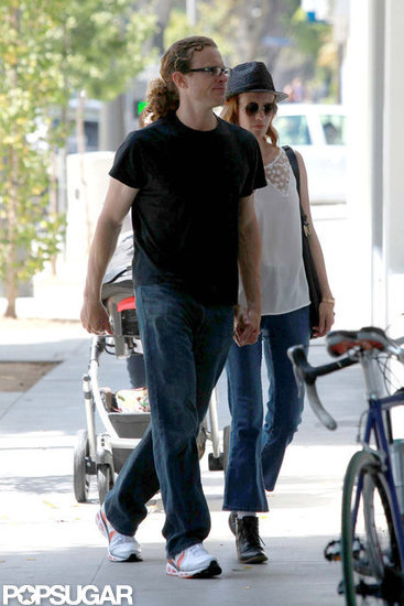 January Jones and a new man went for a walk with Xander.
January Jones and a new man went for a walk with Xander.