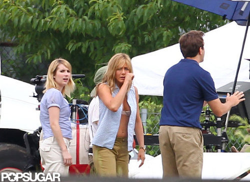Jennifer Aniston Flashes Her Abs in a Bra on Set Jennifer Aniston Flashes Her Abs in a Bra on Set