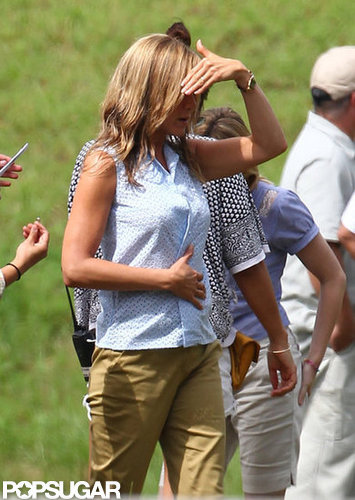 Jennifer Aniston Flashes Her Abs in a Bra on Set Jennifer Aniston Flashes Her Abs in a Bra on Set