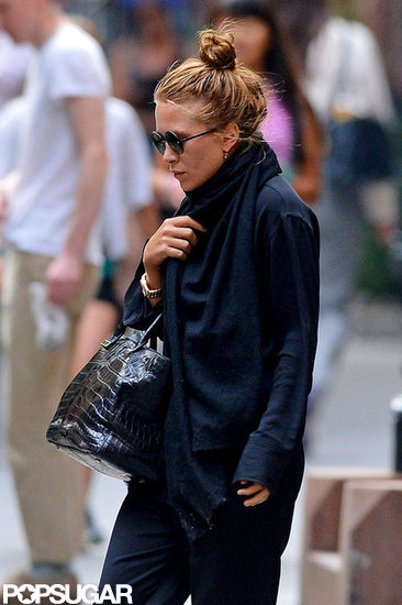Mary-Kate Olsen wore her hair in a high bun while out with boyfriend Olivier Sarkozy in NYC.
Mary-Kate Olsen wore her hair in a high bun while out with boyfriend Olivier Sarkozy in NYC.