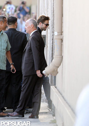 Robert Pattinson donned shades and a smile before his appearance on the Jimmy Kimmel Show.
Robert Pattinson donned shades and a smile before his appearance on the Jimmy Kimmel Show.
