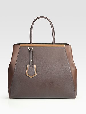 "The minute I saw this Fendi bag on Sarah Jessica Parker's arm a few months ago, I knew it was going to be the It bag of the Fall. I am such a fan of its minimalism. Its clean lines and defined silhouette make it sleek and timeless, and its use of two textures of the same color of leather give the bag depth and keep its look ever-changing in the light. This bag is one that will catch your attention and hold it due to its sophistication and quiet modern attitude. I'm secretly hoping for Fendi to put out an XXL version so I can start toting one around the city."
— Robert Khederian, fashion intern
Fendi 2Jours Large Shopper ($2,430)
"The minute I saw this Fendi bag on Sarah Jessica Parker's arm a few months ago, I knew it was going to be the It bag of the Fall. I am such a fan of its minimalism. Its clean lines and defined silhouette make it sleek and timeless, and its use of two textures of the same color of leather give the bag depth and keep its look ever-changing in the light. This bag is one that will catch your attention and hold it due to its sophistication and quiet modern attitude. I'm secretly hoping for Fendi to put out an XXL version so I can start toting one around the city."
— Robert Khederian, fashion intern
Fendi 2Jours Large Shopper ($2,430)