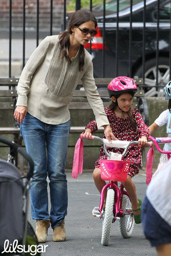 Katie Holmes showed Suri Cruise how to ride a bike Saturday in NYC.
Katie Holmes showed Suri Cruise how to ride a bike Saturday in NYC.