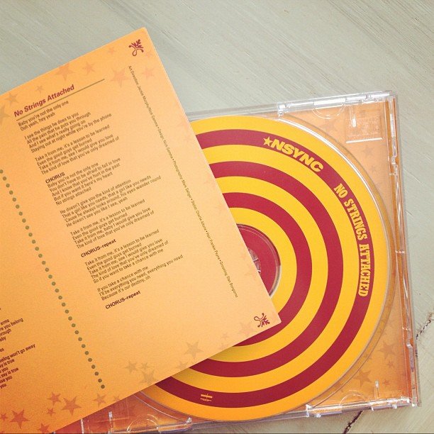 Reading the Lyrics on a CD Case Reading the Lyrics on a CD Case