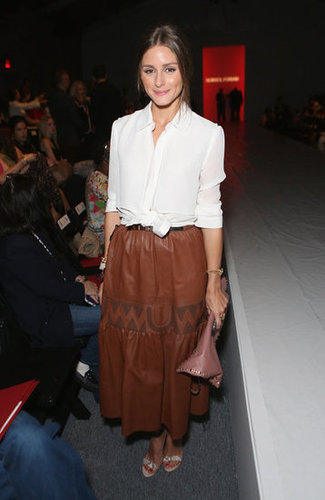 Olivia put a sweet tie-front touch on her luxe brown leather skirt at the Norisol Ferrari show. And to add to the slick texture appeal, she also toted a dusty-pink Valentino clutch.
Olivia put a sweet tie-front touch on her luxe brown leather skirt at the Norisol Ferrari show. And to add to the slick texture appeal, she also toted a dusty-pink Valentino clutch.